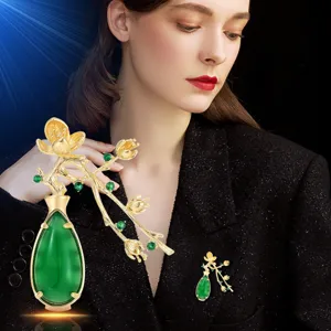 Elegant gold green chalcedony plum blossom vase brooch, perfect for vintage chic daily wear.