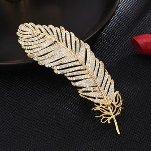 Luxury gold feather brooch pin with sparkling cubic zirconia for women suit fashion