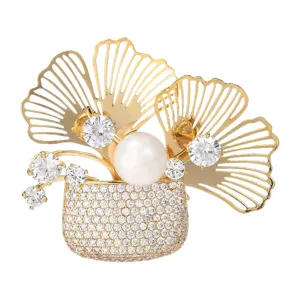 Elegant ginkgo leaf flower basket brooch with sparkling cubic zirconia and pearl, gold plated.
