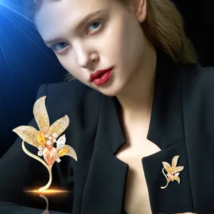 Elegant colored zircon leaf brooch for women, high-end fashion plant pin for winter coat accessories.