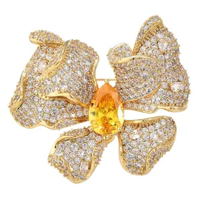 Exquisite luxury gold-plated zircon butterfly brooch featuring sparkling crystal pave and center yellow stone.
