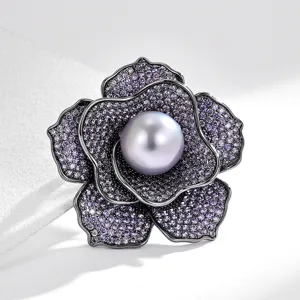 Luxurious purple zircon flower brooch with a elegant central grey pearl for women.