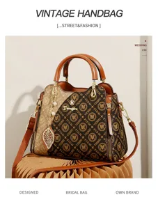 Sac à main élégant pour femme avec imprimé lettres, pendentif feuille et grande capacité.