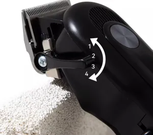 Professional pet hair clipper detail close-up showing adjustable gear settings 1 to 4.