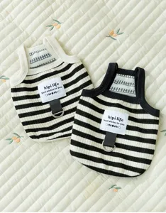 Close-up detail of black and white striped pet vest with D-ring, breathable summer dog clothes.