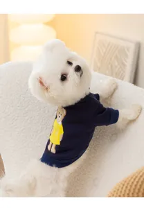 Detail shot of cute puppy wearing navy blue bear pattern warm pet sweatshirt for small dogs.