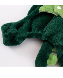 Green dinosaur pet plush costume detail showing soft flannel fabric and cute dorsal spikes.