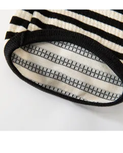 Detailed view of striped pet clothes inner lining texture breathable mesh fabric summer wear