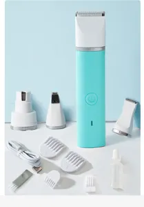 Professional pet grooming clipper set with multiple interchangeable heads and combs.
