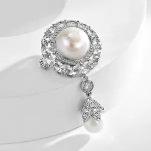 Elegant vintage court style freshwater pearl brooch with sparkling zircon and drop.