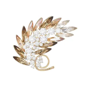 Elegant crystal feather brooch in gold tone, sparkling rhinestone lapel pin for women suits.