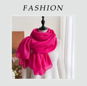 Detailed view of the bright pink cotton linen scarf, elegant solid color long shawl.