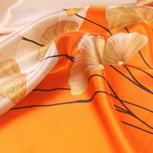 Elegant orange satin square scarf 90cm, luxury botanical print silk feel headscarf for women.