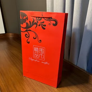 Red paper gift bag for scarf packaging, elegant empty box for festival gift giving use