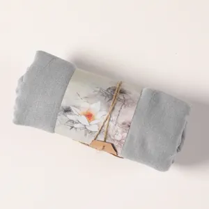 Rolled grey cotton linen scarf detail, solid color long shawl with elegant lotus paper band.