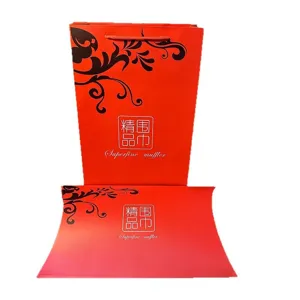 Red gift box and bag set with Chinese style floral pattern for scarves and silk gifts.