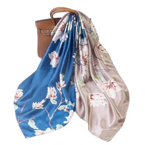 Elegant 90cm silk square scarf featuring stunning floral print, luxurious drape and versatile design.