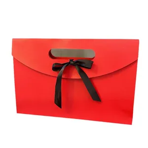 Red envelope gift box with black ribbon bow for silk scarf and towel packaging main view