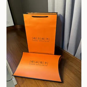 Orange silk scarf gift box packaging set, paper bag and pillow box for luxury gifts.