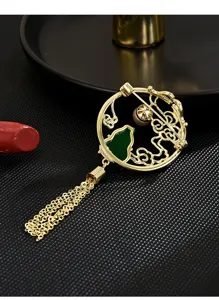 Elegante spilla cinese a forma di zucca con nappa, accessorio dorato per abito da donna.