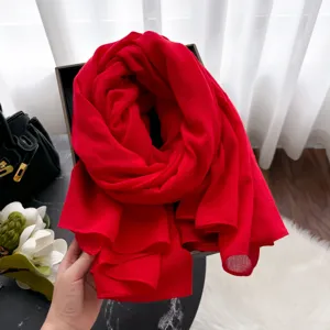 Red cotton linen scarf for women, long solid color shawl, elegant autumn winter accessory.