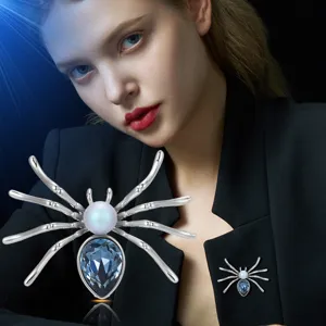 Elegante silberne Spinnenbrosche mit Perle und blauem Kristall für Damenmantel Jacke