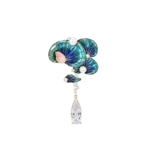 Exquisite lotus enamel brooch featuring pearls and teardrop crystals, elegant coat pin accessory.