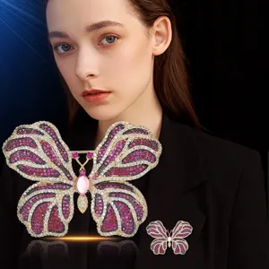 Luxueuse broche papillon en cristal pour femmes, élégante épingle en strass pour manteaux.