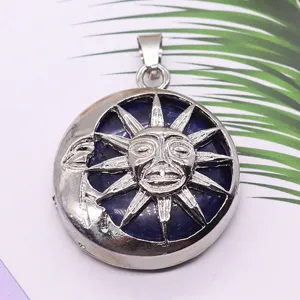 Silver-tone sun and moon face pendant necklace with deep blue lapis lazuli inlay.