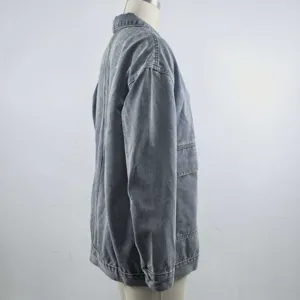 Detailed side view of a vintage grey loose fit denim jacket presented on a mannequin.