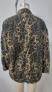 Detailed back view of a retro leopard print loose denim jacket for women on mannequin