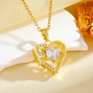 Gold heart zircon pendant necklace detail view, fashion titanium steel jewelry accessory for women.