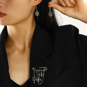 Elegant Kazakh style silver brooch and earring set with ethnic charms for women
