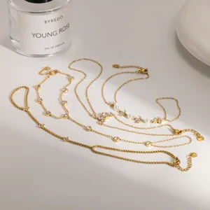 Detailed shot of trendy gold stainless steel layered finger bracelet with sparkling rhinestones.