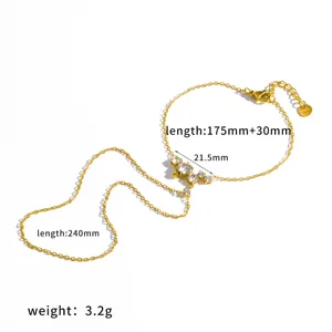 Gold stainless steel finger bracelet hand chain with cubic zirconia crystals, elegant design.