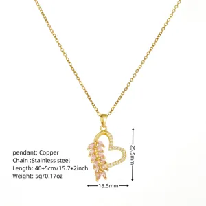 Gold heart pendant necklace detail showing pink marquise cubic zirconia and chain size.