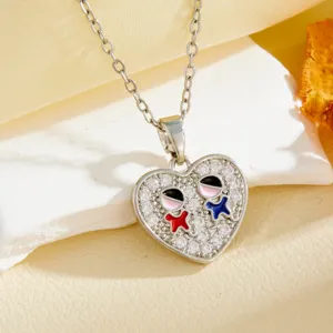 Heart shaped crystal rhinestone pendant necklace detail view, stylish silver chain accessory.