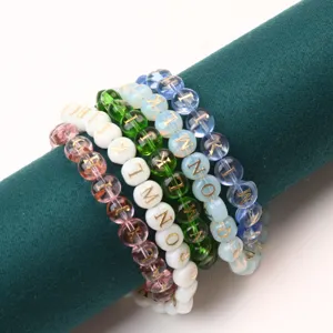 Colorful glass letter bead bracelets set, handmade DIY jewelry accessories and beaded charms.