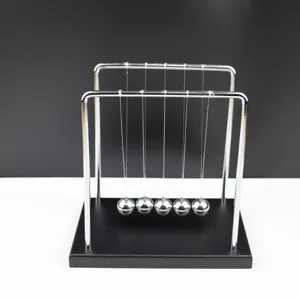 Metal Newton's cradle balance balls physics science toy desktop office decor detail view