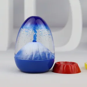 Close-up detail of the creative liquid volcano eruption motion bubbler toy desk decor.