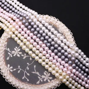 Colored imitation pearl bead strands for DIY jewelry making and accessories crafting.