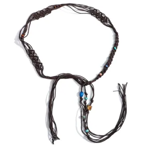 Bohemian brown braided rope belt detail shot, handmade knotting with colorful beads and tassels.