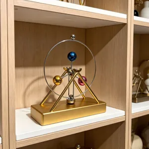 Hemelse kinetische kunst perpetual motion bureau speelgoed gouden basis decoratie.