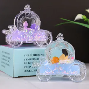 Gedetailleerd overzicht van de acryl pompoenwagen vloeibare zand ornament decoratie.