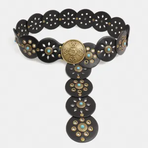 Vintage western style black leather disc metal rivet turquoise statement waist belt detail.