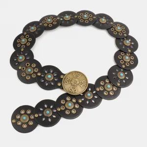 Western style black round disc patchwork belt with vintage metal buckle and turquoise stones.