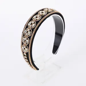 Close-up detail of luxury baroque rhinestone headband, sparkling crystal hair accessory.