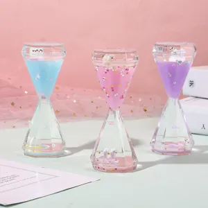 Cute liquid motion bubbler hourglass sensory toy table decor desktop ornament gift for kids.