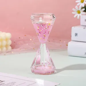 Pink liquid motion bubbler diamond hourglass ornament, cute desktop toy for kids gift.