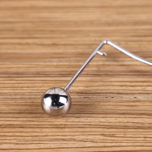 Detailweergave van metalen balansspeelgoed, bureau zwaartekracht ornament, leuk geschenk.